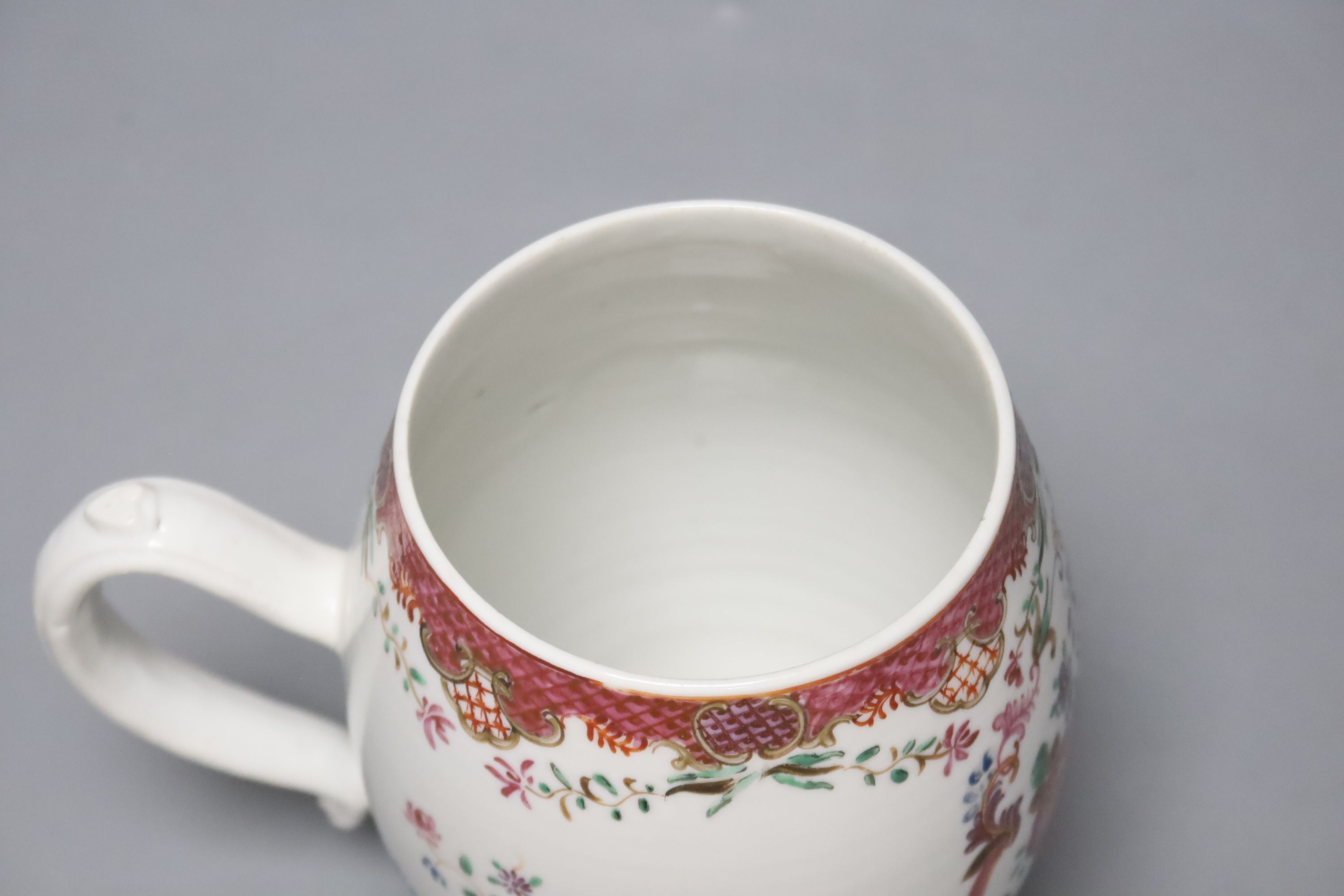 A large 18th century Chinese famille rose tankard, height 14.5cm